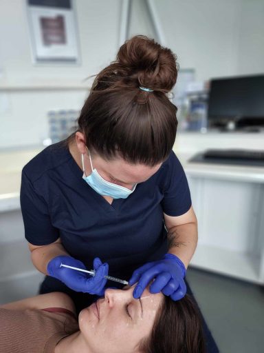 Upper face Botox treatment in progress